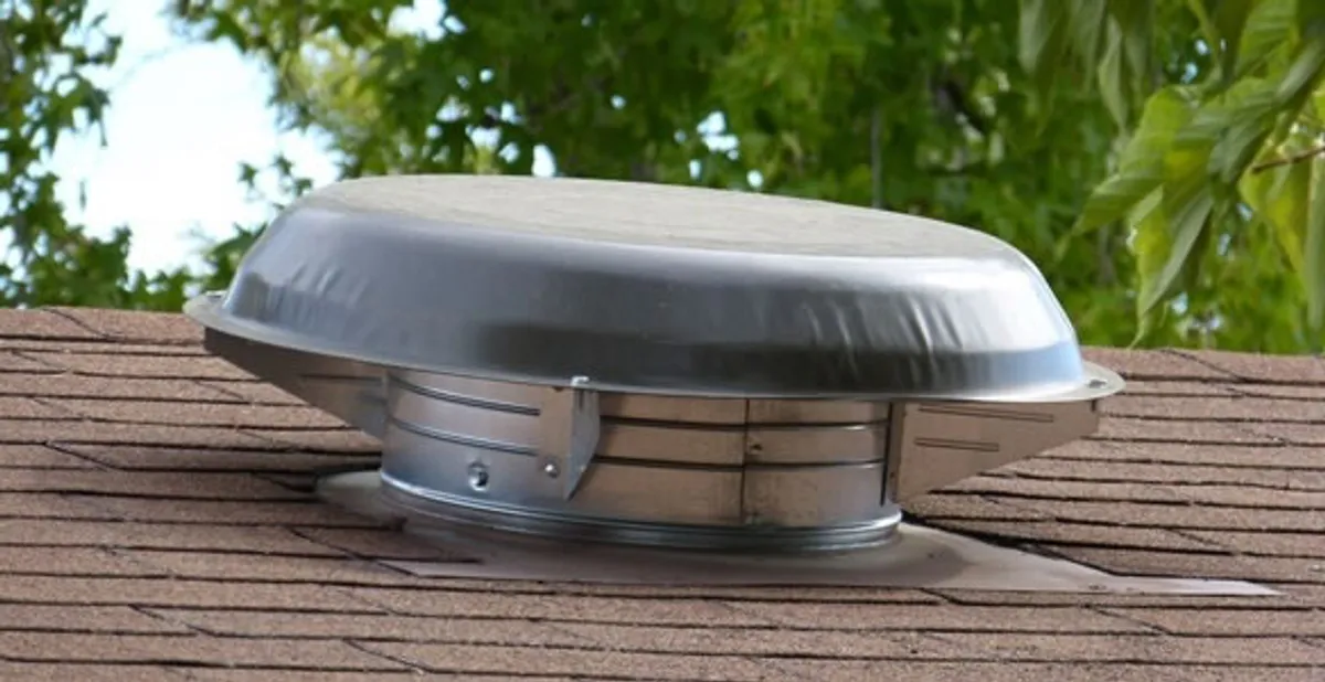 attic fan installation services with low-profile roof ventilation unit in Palm Springs, CA