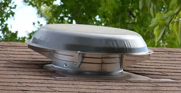 attic fan installation services with low-profile roof ventilation unit in Palm Springs, CA