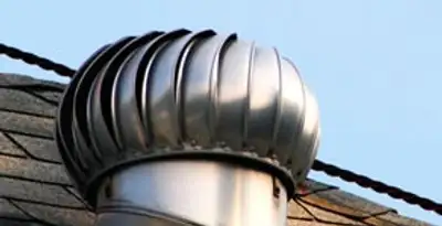 attic fan installation services with professionally installed roof ventilation unit in Palm Springs, CA