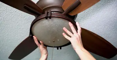 Ceiling fan repair and reinstallation on ceiling mount in Palm Springs, CA