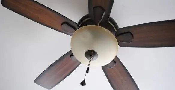 Fully installed ceiling fan with balanced blades and light fixture in Palm Springs, CA
