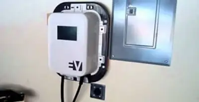 Electric car charger installation with wall-mounted EV charging station in Palm Springs, CA