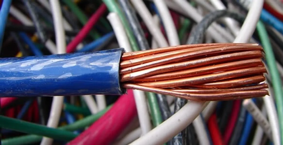 electrical wiring services showing exposed copper conductors and cable preparation in Palm Springs, CA