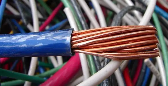 electrical wiring services showing exposed copper conductors and cable preparation in Palm Springs, CA