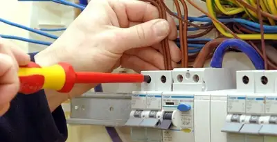 electrician services performing professional electrical panel wiring and connections in Palm Springs, CA