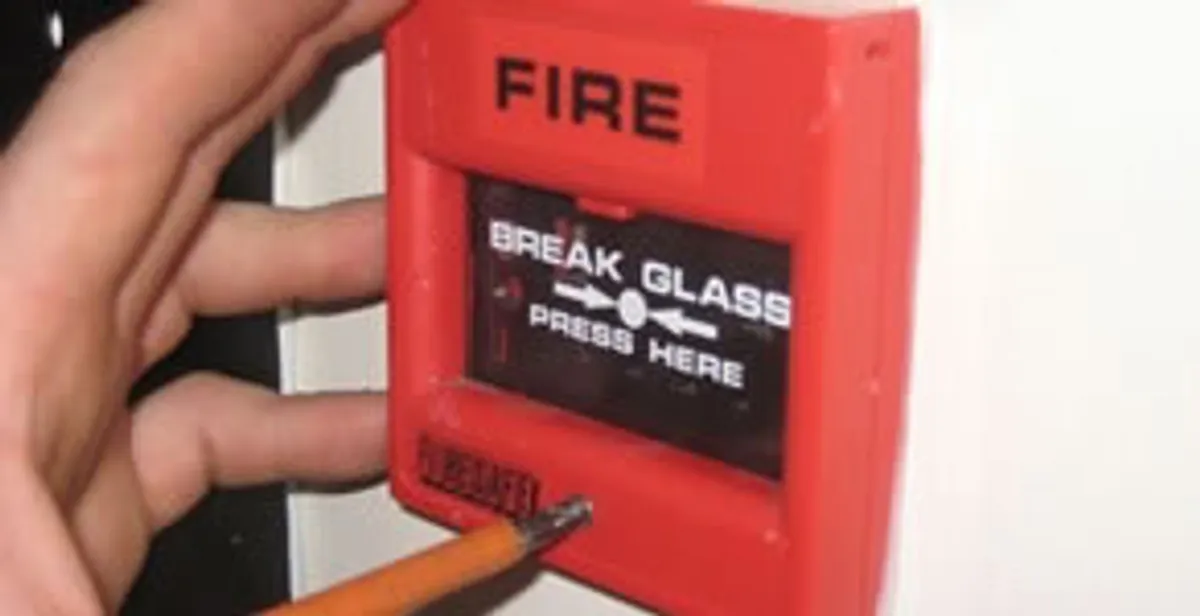 fire alarm installation service showing manual fire alarm pull station installed by licensed electricians in Palm Springs, CA