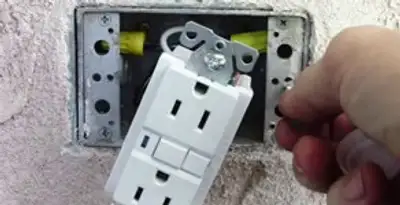 gfci circuits service showing installation of a ground fault circuit interrupter outlet by licensed electricians in Palm Springs, CA