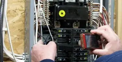 Home electrical inspection of circuit breaker panel by licensed electrician in Palm Springs, CA