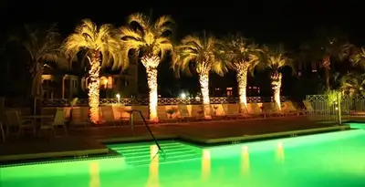 landscape lighting installation services illuminating outdoor recreational areas in Palm Springs, CA