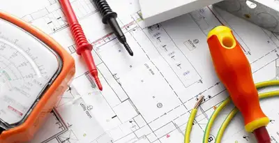 licensed electrician planning and testing electrical systems using professional tools in Palm Springs, CA