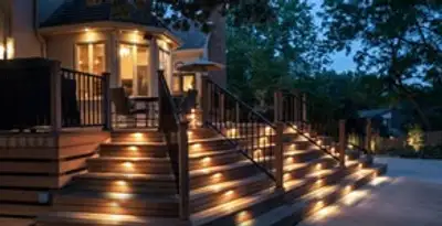 Residential electrician installing outdoor lighting for home safety in Palm Springs, CA