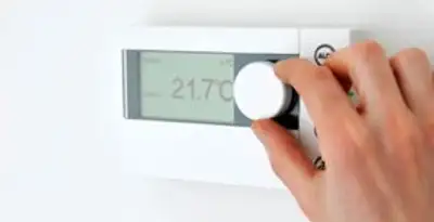 Thermostat installation service with professional adjusting temperature control in Palm Springs, CA