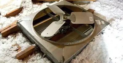 whole house fan installation services with attic-mounted ventilation unit in Palm Springs, CA